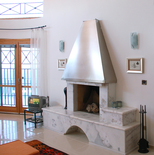 Photo: Open Fireplace in the Livingroom of Villa Yakomoz, rental seafront Holiday Home with Pool for 2-4 people in Kas (Province Antalya) at the Lycian Coast of Turkey